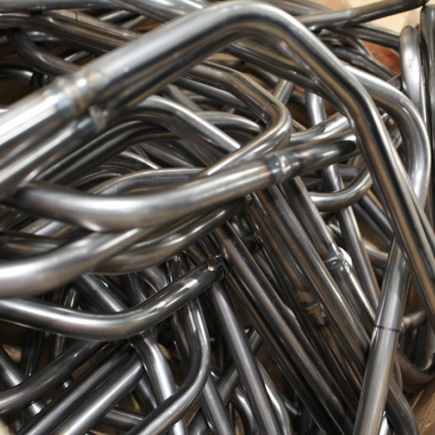 Bent tubing for manufacturing military seating