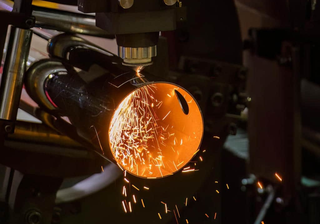 Metal tube having holes cut with a laser cutter.